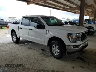 2023 Ford F-150 XL with VIN 1FTFW1E59PKE35312, listed as a Copart auction lot 50796195 with 19,849 mi miles and Salvage Title. Bid and sale history available at carsss.com. Image 4.