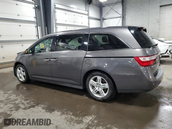 2013 Honda Odyssey Touring with VIN 5FNRL5H90DB071415, listed as a Copart auction lot 52697785 with 200,430 mi miles and Salvage Title. Bid and sale history available at carsss.com. Image 2.