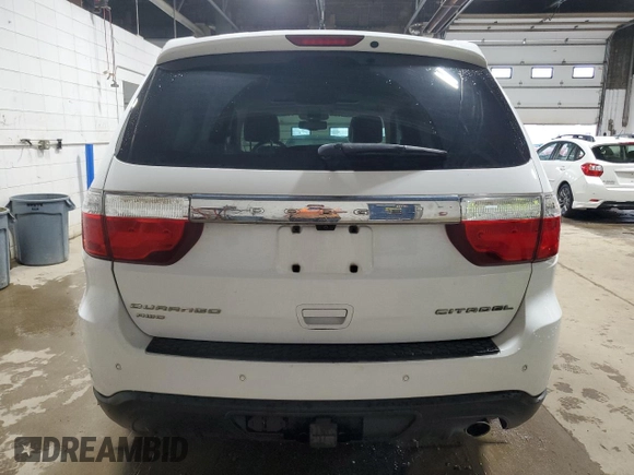 2013 Dodge Durango Citadel with VIN 1C4RDJEG2DC518008, listed as a Copart auction lot 61790705 with 165,042 mi miles and Salvage title. Bid and sale history available at DreamBid. Image 6.