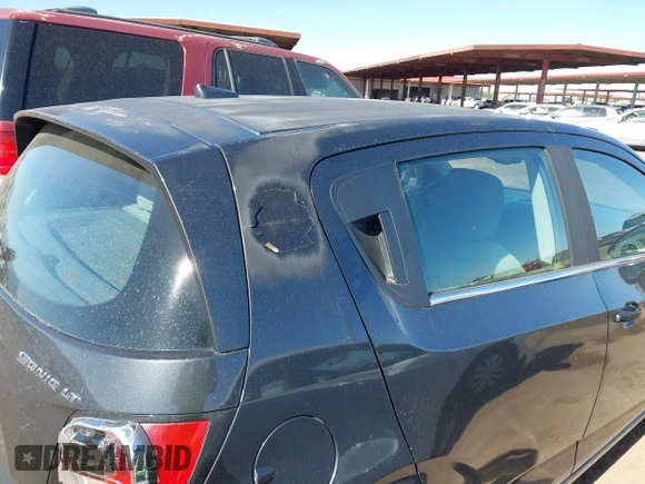 2014 Chevrolet Sonic LT with VIN 1G1JC6SH1E4111523, listed as a IAAI auction lot 41693815 with 147,353 mi miles. Bid and sale history available at carsss.com. Image 6.