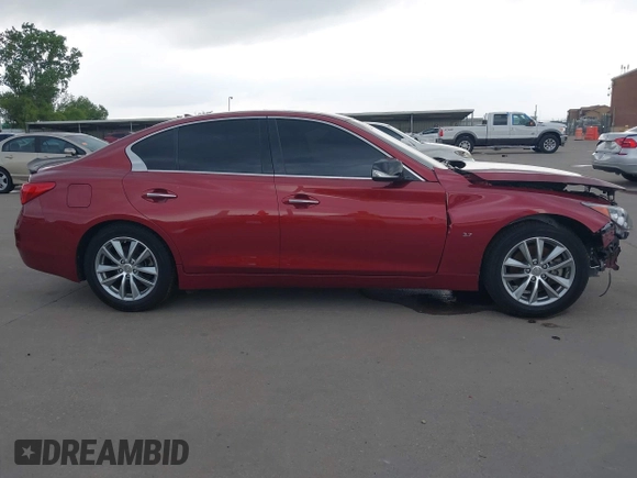 2014 Infiniti Q50 Premium z VIN JN1BV7AP8EM673359, wystawiony jako IAAI lot #42300427 z przebiegiem 118 779 mil mil oraz . Historia ofert i sprzedaży dostępna na DreamBid. Obrazek 13.