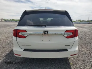 2019 Honda Odyssey Touring z VIN 5FNRL6H80KB501681, wystawiony jako Copart lot #58814945 z przebiegiem 105 287 mil mil oraz Szkoda całkowita • Salvage title. Historia ofert i sprzedaży dostępna na DreamBid. Obrazek 6.