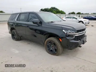2023 Chevrolet Tahoe Commercial with VIN 1GNSCLED7PR428027, listed as a Copart auction lot 56738455 with 6,599 mi miles and Salvage title. Bid and sale history available at DreamBid. Image 4.