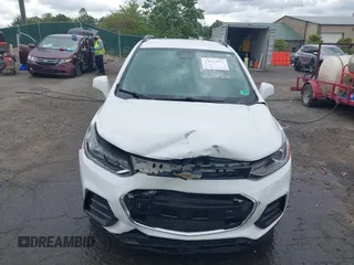 2019 Chevrolet Trax LT z VIN KL7CJLSB4KB828096, wystawiony jako IAAI lot #42233971 z przebiegiem 99 112 mil mil oraz . Historia ofert i sprzedaży dostępna na DreamBid. Obrazek 13.