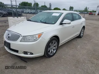 2012 Buick LaCrosse Premium 2 z VIN 1G4GF5E34CF289314, wystawiony jako IAAI lot #42331342 z przebiegiem 300 129 mil mil oraz . Historia ofert i sprzedaży dostępna na DreamBid. Obrazek 2.