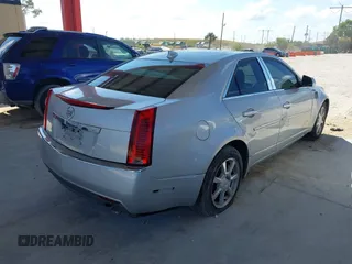 2009 Cadillac CTS AWD w/1SB with VIN 1G6DS57V190159989, listed as a IAAI auction lot 41897485 with 115,439 mi miles. Bid and sale history available at carsss.com. Image 4.