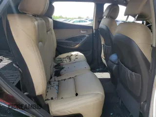 2017 Hyundai Santa Fe 2.4L z VIN 5NMZUDLB9HH013230, wystawiony jako Copart lot #55888975 z przebiegiem Nie podano mil oraz Szkoda całkowita • Salvage title. Historia ofert i sprzedaży dostępna na DreamBid. Obrazek 11.