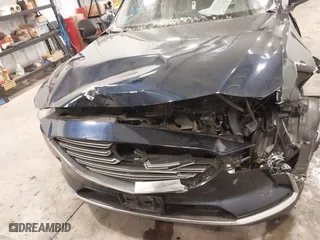 2016 Mazda CX-9 Grand Touring with VIN JM3TCBDY9G0109770, listed as a IAAI auction lot 41551085 with 131,812 mi miles. Bid and sale history available at carsss.com. Image 13.