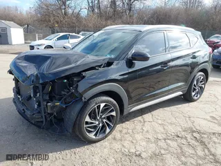 2021 Hyundai Tucson Sport with VIN KM8J3CAL6MU411855, listed as a IAAI auction lot 41694634 with 67,779 mi miles. Bid and sale history available at carsss.com. Image 2.
