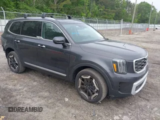 2025 Kia Telluride S z VIN 5XYP64GCXSG619190, wystawiony jako IAAI lot #42092605 z przebiegiem 1 456 mil mil oraz . Historia ofert i sprzedaży dostępna na DreamBid. Obrazek 1.
