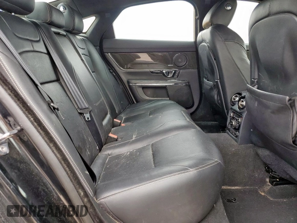 2015 Jaguar XJ with VIN SAJWA1CZ8F8V85381, listed as a Copart auction lot 57464225 with 161,938 mi miles and Salvage Title. Bid and sale history available at DreamBid. Image 10.
