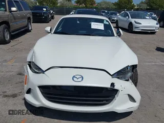 2021 Mazda MX-5 Miata Grand Touring z VIN JM1NDAM75M0450871, wystawiony jako IAAI lot #42060495 z przebiegiem 48 670 mil mil oraz . Historia ofert i sprzedaży dostępna na DreamBid. Obrazek 12.