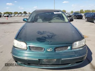 1999 Oldsmobile Cutlass GL z VIN 1G3NB52M3X6330302, wystawiony jako Copart lot #77639734 z przebiegiem 106 995 mil mil oraz Czysty tytuł • Clean title. Historia ofert i sprzedaży dostępna na DreamBid. Obrazek 5.