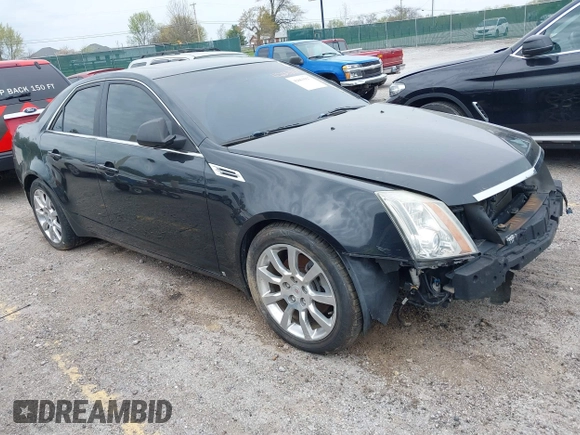 2009 Cadillac CTS AWD w/1SA with VIN 1G6DG577890126877, listed as a IAAI auction lot 42063927 with 117,444 mi miles. Bid and sale history available at carsss.com. Image 1.