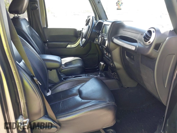 2017 Jeep Wrangler Unlimited Rubicon Recon with VIN 1C4HJWFG2HL560846, listed as a IAAI auction lot 42532745 with 101,285 mi miles and . Bid and sale history available at DreamBid. Image 5.