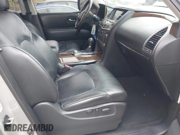2016 Infiniti QX80 with VIN JN8AZ2NE0G9120708, listed as a IAAI auction lot 40991139 with 129,534 mi miles and . Bid and sale history available at DreamBid. Image 5.