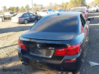 2014 BMW M5 with VIN WBSFV9C50ED097488, listed as a IAAI auction lot 41185321 with 72,891 mi miles. Bid and sale history available at carsss.com. Image 16.