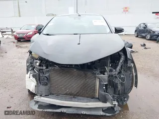 2021 Toyota C-HR LE with VIN JTNKHMBX9M1106493, listed as a IAAI auction lot 41557468 with 67,710 mi miles. Bid and sale history available at carsss.com. Image 6.
