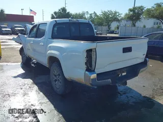 2017 Toyota Tacoma SR5 with VIN 5TFAZ5CNXHX044976, listed as a IAAI auction lot 42052922 with 149,116 mi miles and . Bid and sale history available at DreamBid. Image 3.