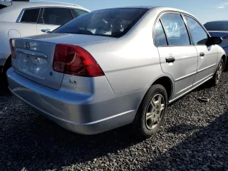 2001 Honda Civic LX with VIN 2HGES16531H595630, listed as a Copart auction lot 74149774 with 50,704 mi miles and Salvage Title. Bid and sale history available at carsss.com. Image 3.