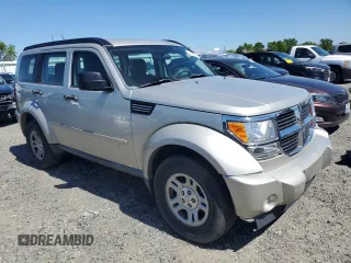 2009 Dodge Nitro SE z VIN 1D8GT28K19W541402, wystawiony jako Copart lot #57487874 z przebiegiem 189 653 mil mil oraz Szkoda całkowita • Salvage title. Historia ofert i sprzedaży dostępna na DreamBid. Obrazek 4.