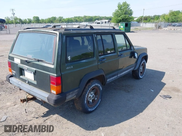 1996 Jeep Cherokee Sport with VIN 1J4FJ68S0TL211339, listed as a IAAI auction lot 42164217 with 193,080 mi miles and . Bid and sale history available at DreamBid. Image 4.