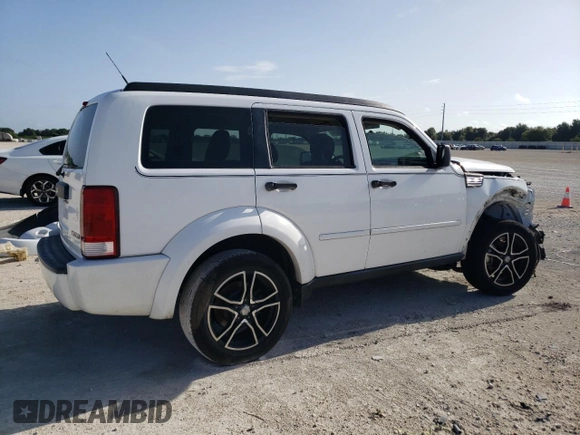 2011 Dodge Nitro SE z VIN 1D4PT2GK3BW520236, wystawiony jako Copart lot #64354194 z przebiegiem Nie podano mil oraz Szkoda całkowita • Salvage title. Historia ofert i sprzedaży dostępna na DreamBid. Obrazek 3.