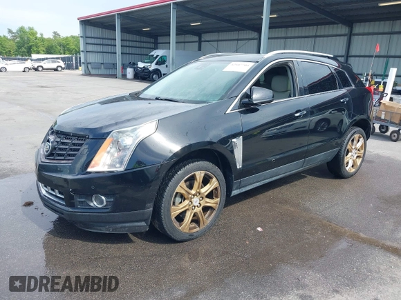 2014 Cadillac SRX Performance Collection with VIN 3GYFNCE31ES683465, listed as a IAAI auction lot 42107705 with 117,285 mi miles. Bid and sale history available at carsss.com. Image 2.