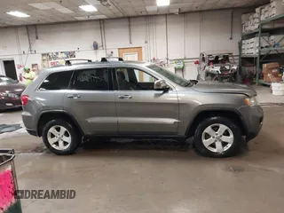 2011 Jeep Grand Cherokee Laredo with VIN 1J4RR4GG7BC578079, listed as a IAAI auction lot 42491750 with 197,581 mi miles and . Bid and sale history available at DreamBid. Image 14.