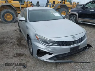 2019 Kia Optima LX z VIN 5XXGT4L38KG307534, wystawiony jako IAAI lot #42417419 z przebiegiem 148 013 mil mil oraz . Historia ofert i sprzedaży dostępna na DreamBid. Obrazek 1.