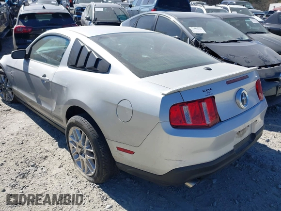 2012 Ford Mustang V6 Premium with VIN 1ZVBP8AM1C5265745, listed as a IAAI auction lot 41705931 with 145,000 mi miles. Bid and sale history available at carsss.com. Image 3.