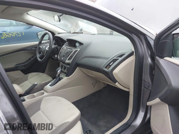2012 Ford Focus SE with VIN 1FAHP3F26CL220986, listed as a IAAI auction lot 41719127 with 127,050 mi miles and . Bid and sale history available at DreamBid. Image 5.