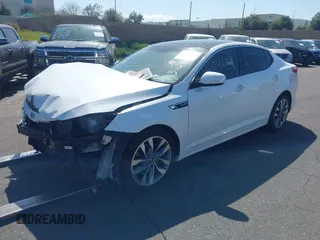 2014 Kia Optima SXL Turbo with VIN 5XXGR4A60EG270821, listed as a IAAI auction lot 41909669 with 242,119 mi miles and . Bid and sale history available at DreamBid. Image 2.