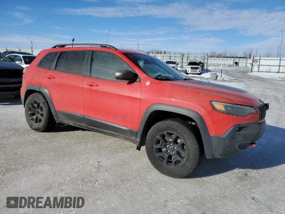 2019 Jeep Cherokee Trailhawk with VIN 1C4PJMBX7KD361816, listed as a Copart auction lot 46457465 with 244,301 mi miles and Salvage Title. Bid and sale history available at DreamBid. Image 4.