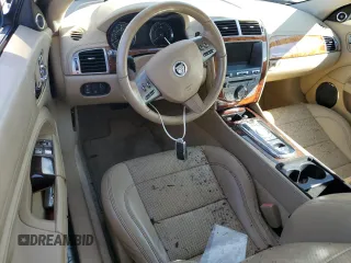 2010 Jaguar XK with VIN SAJWA4GB5ALB36425, listed as a Copart auction lot 74035264 with 0 mi miles and Salvage Title. Bid and sale history available at carsss.com. Image 8.