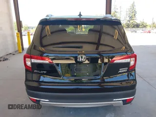 2021 Honda Pilot Touring 8-Passenger z VIN 5FNYF6H99MB049728, wystawiony jako IAAI lot #42194602 z przebiegiem 41 374 mil mil oraz . Historia ofert i sprzedaży dostępna na DreamBid. Obrazek 17.