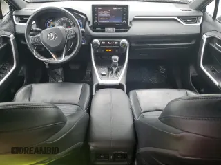 2021 Toyota RAV4 Hybrid XSE with VIN 4T3E6RFVXMU032385, listed as a Copart auction lot 53966625 with 113,506 mi miles and Salvage title. Bid and sale history available at DreamBid. Image 8.
