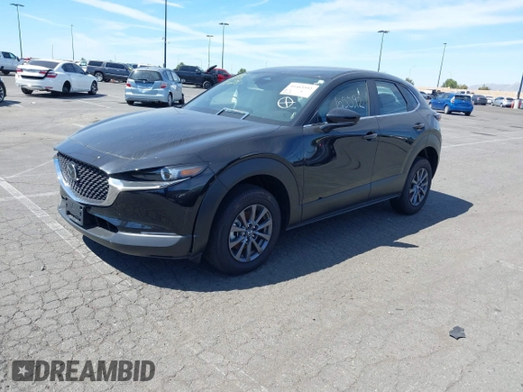 2024 Mazda CX-30 2.5 S with VIN 3MVDMBAM5RM687164, listed as a IAAI auction lot 41465592 with 4,705 mi miles. Bid and sale history available at carsss.com. Image 2.