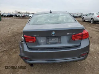 2018 BMW 3 Series 320i xDrive z VIN WBA8A3C57JA491717, wystawiony jako Copart lot #49509515 z przebiegiem 57 141 mil mil oraz Szkoda całkowita • Salvage title. Historia ofert i sprzedaży dostępna na DreamBid. Obrazek 6.