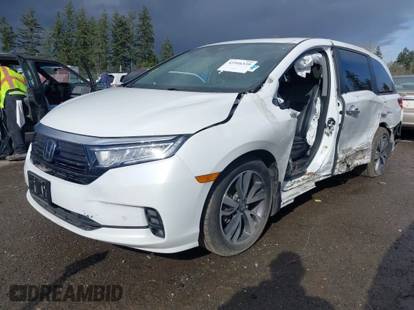 2021 Honda Odyssey Touring with VIN 5FNRL6H87MB015310, listed as a IAAI auction lot 41916339 with 58,808 mi miles. Bid and sale history available at carsss.com. Image 2.