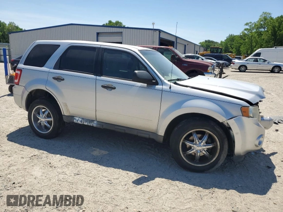 2011 Ford Escape XLS with VIN 1FMCU9C77BKC43743, listed as a Copart auction lot 54683435 with 186,928 mi miles and Clean title. Bid and sale history available at DreamBid. Image 4.