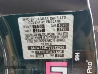 2007 Jaguar XK with VIN SAJWA44C779B12243, listed as a Copart auction lot 77239534 with 0 mi miles and Salvage Title. Bid and sale history available at carsss.com. Image 13.