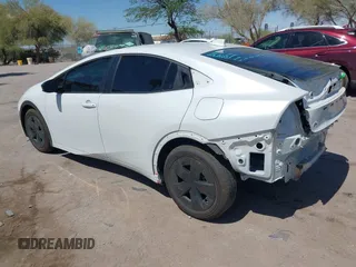 2024 Toyota Prius LE with VIN JTDACAAU5R3046244, listed as a IAAI auction lot 42464523 with 13,590 mi miles and . Bid and sale history available at DreamBid. Image 3.