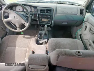 2003 Toyota Tacoma with VIN 5TEVL52N63Z207712, listed as a Copart auction lot 56349545 with 166,194 mi miles and Salvage title. Bid and sale history available at DreamBid. Image 8.