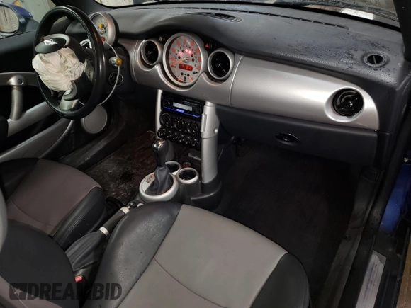 2007 MINI Convertible with VIN WMWRF33507TG16448, listed as a Copart auction lot 88474495 with 148,147 mi miles and Salvage Title. Bid and sale history available at DreamBid. Image 8.