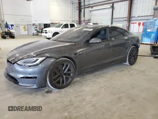 2021 Tesla Model S Long Range with VIN 5YJSA1E51MF429302, listed as a Copart auction lot 58242465 with 148,472 mi miles and Salvage title. Bid and sale history available at DreamBid. Image 1.