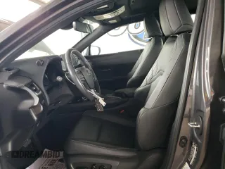 2023 Lexus UX 250h F Sport with VIN JTHB9JBHXP2065586, listed as a Copart auction lot 59037755 with 23,620 mi miles and Salvage title. Bid and sale history available at DreamBid. Image 7.