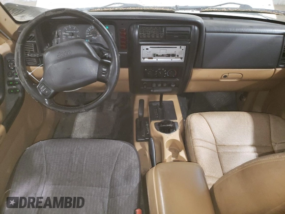 1998 Jeep Cherokee Sport with VIN 1J4FJ68S2WL239891, listed as a Copart auction lot 62966025 with 128,226 mi miles and Clean title. Bid and sale history available at DreamBid. Image 8.