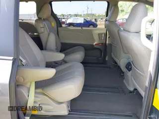 2014 Toyota Sienna XLE with VIN 5TDYK3DC6ES414892, listed as a IAAI auction lot 42545666 with 135,805 mi miles and . Bid and sale history available at DreamBid. Image 8.