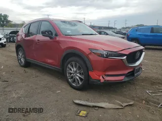2019 Mazda CX-5 Grand Touring z VIN JM3KFBDM2K0665993, wystawiony jako Copart lot #58440685 z przebiegiem 38 306 mil mil oraz Szkoda całkowita • Salvage title. Historia ofert i sprzedaży dostępna na DreamBid. Obrazek 4.